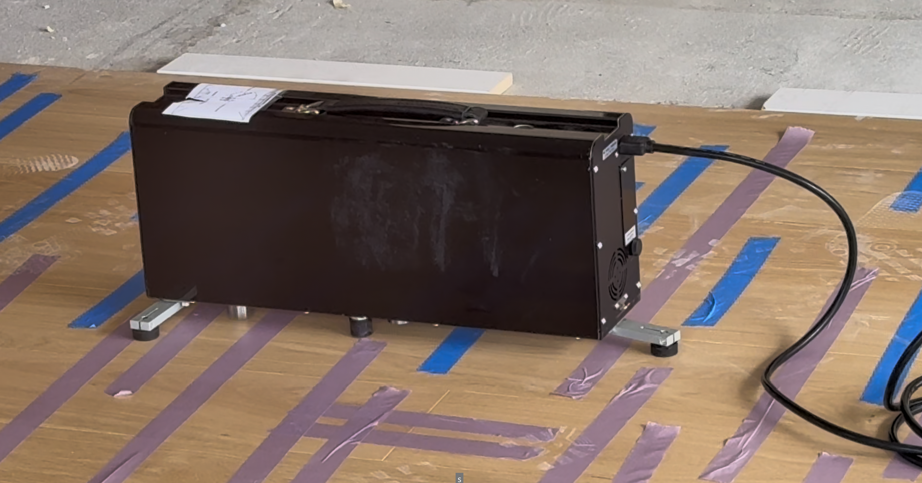 Tapping machine on flooring surface